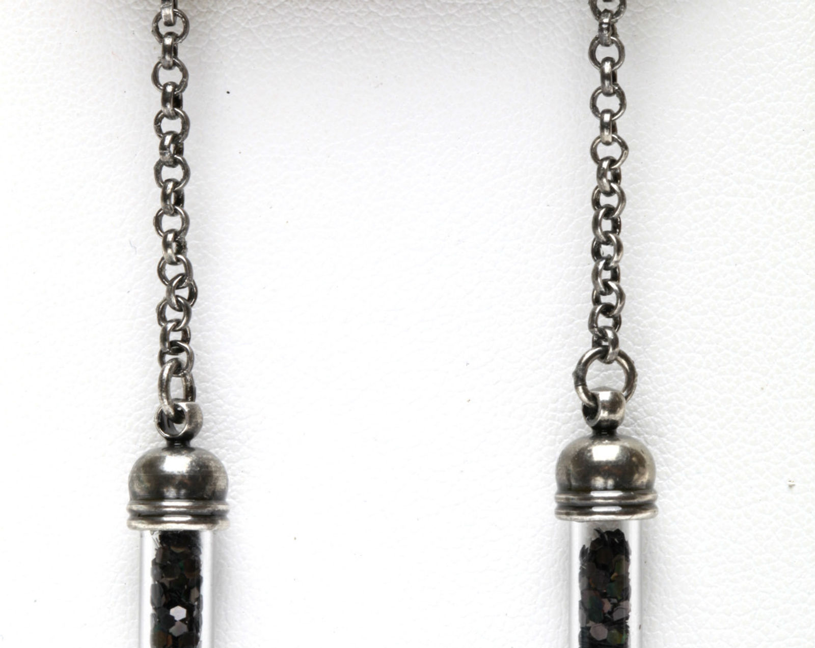 KIRKS FOLLY DUST of the DRAGON'S TALON LEVERBACK EARRINGS silvertone