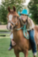 Beautiful cowgirl on Arabian horse