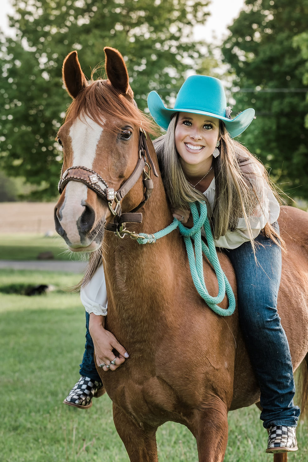 Beautiful cowgirl on Arabian horse