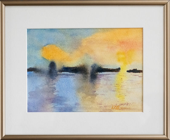 Soft focus view, looking across the Mekong River with tones of yellow and blue