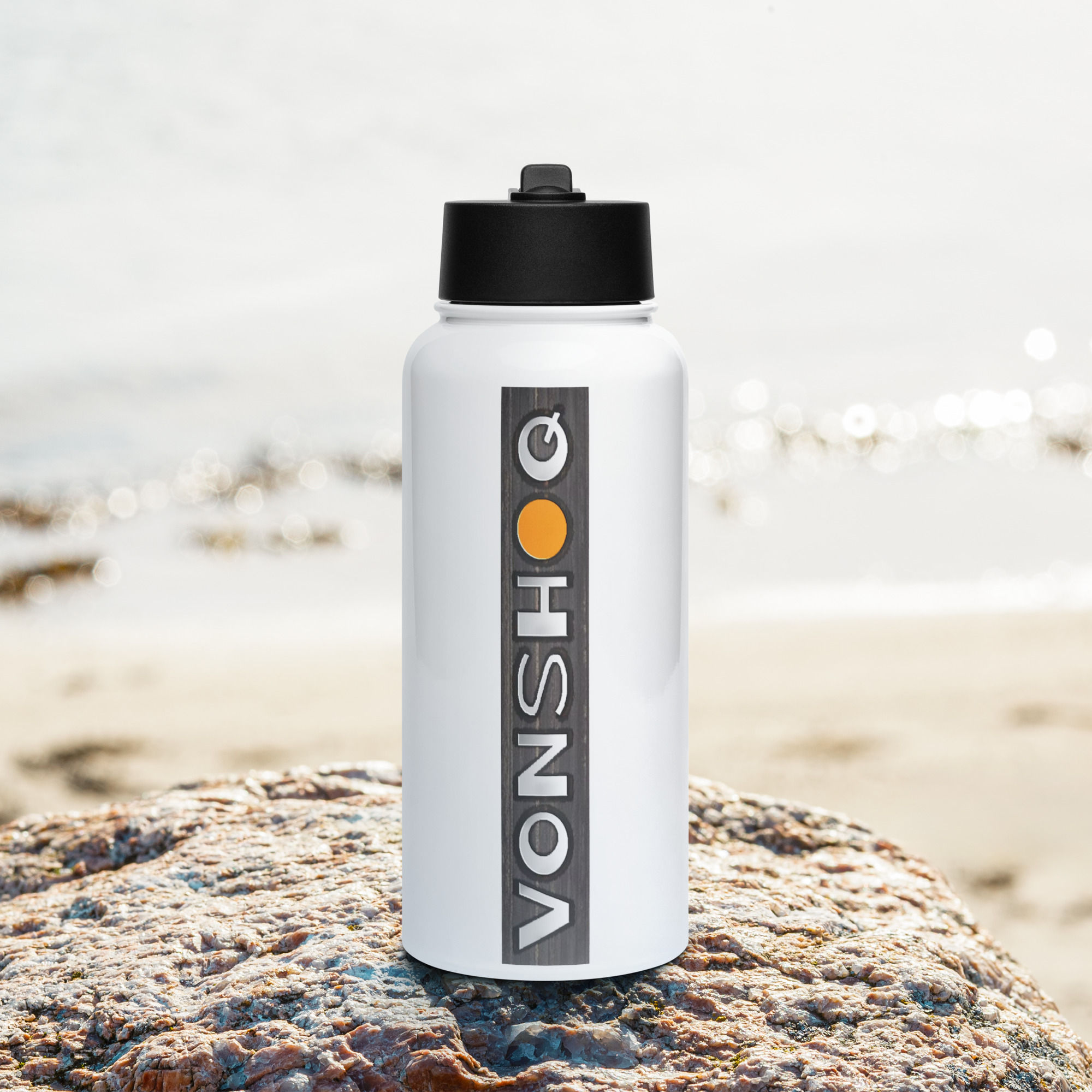 Stainless steel water bottle with a straw lid