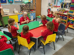 Taste testing fruit and then making them into smoothiessmoothies
