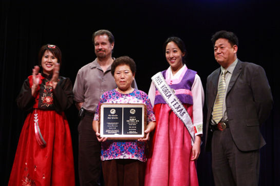 Kristopher Ahn, Miss Lynn Jo, Miss Korea Texas, Helen Chang and Houston Community College standing with the winner of the best kimcee recipe 