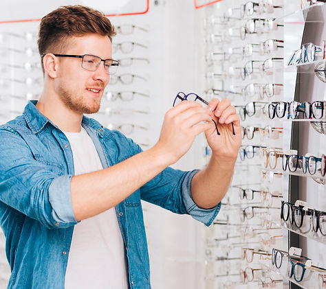 man-looking-new-glasses-optometrist.jpg