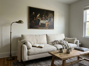 Timeless living room with classic landscape wall art in a walnut frame