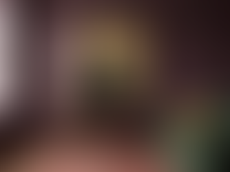 "The Young Lord of the Rose Window" above a wood console in a plum living room — interior mockup