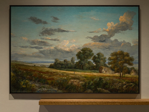 Large classical landscape painting of a solitary figure crossing a meadow under gathering clouds.