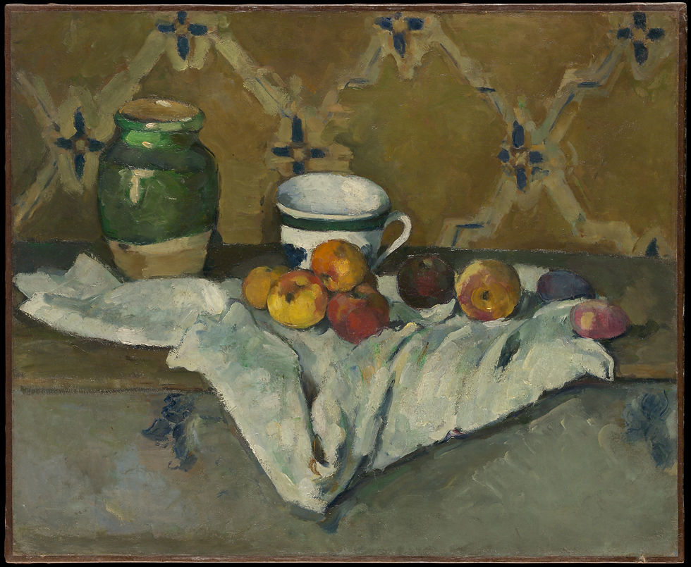 Jar, cup, and apples on draped white cloth against patterned wallpaper.