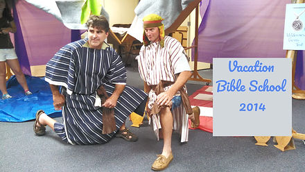 Pastor chris and Bill Booth vacation bible school 2014