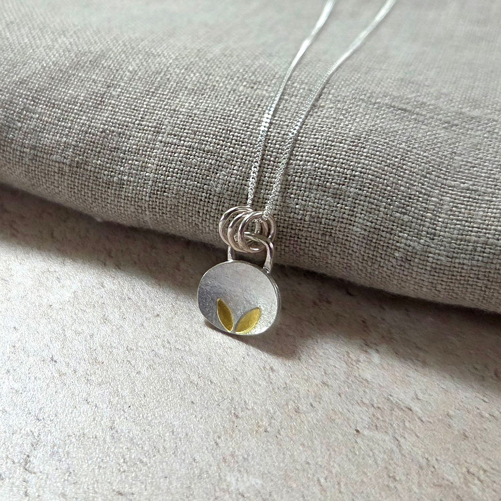 handmade botanical silver and gold necklace