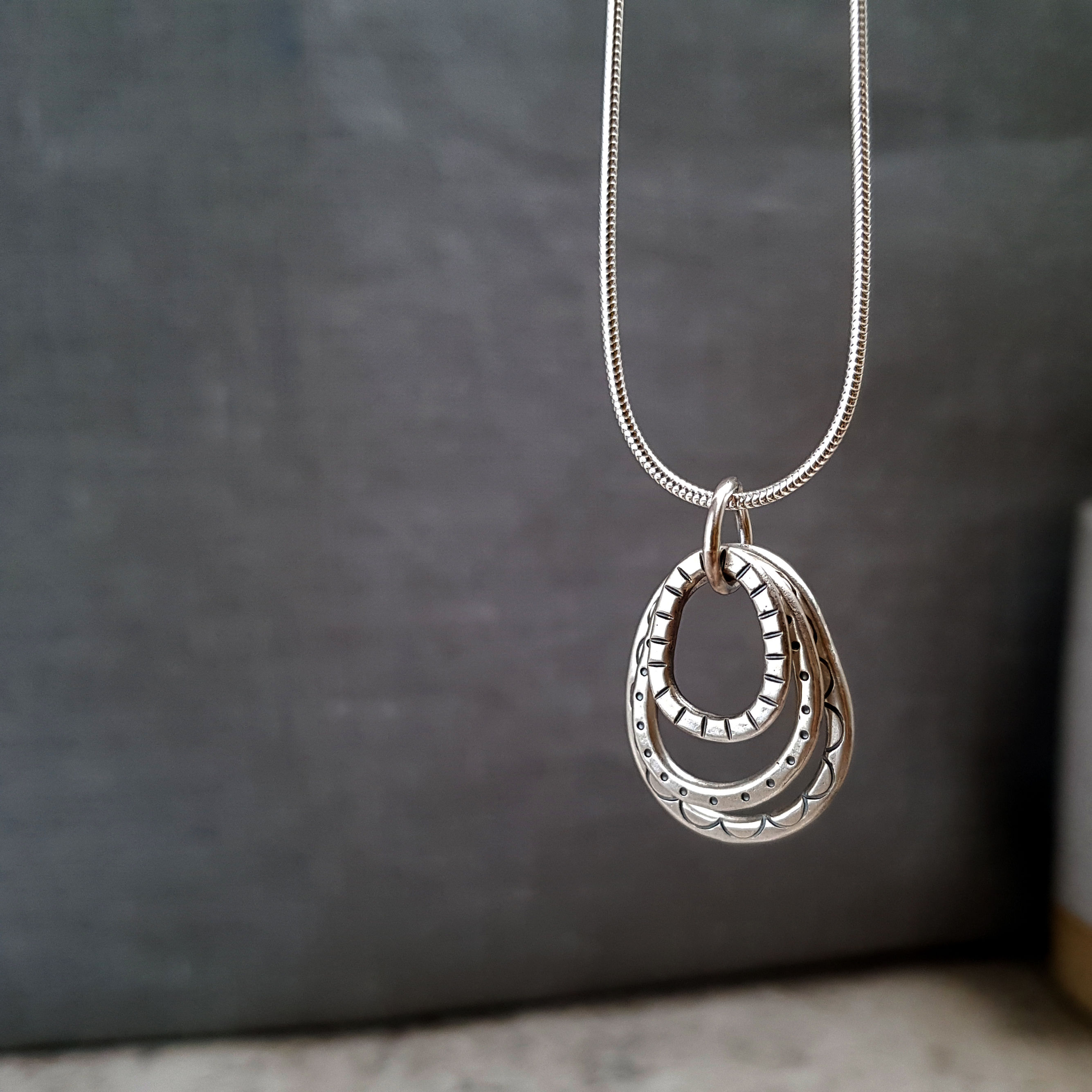 Silver hoop charm necklace