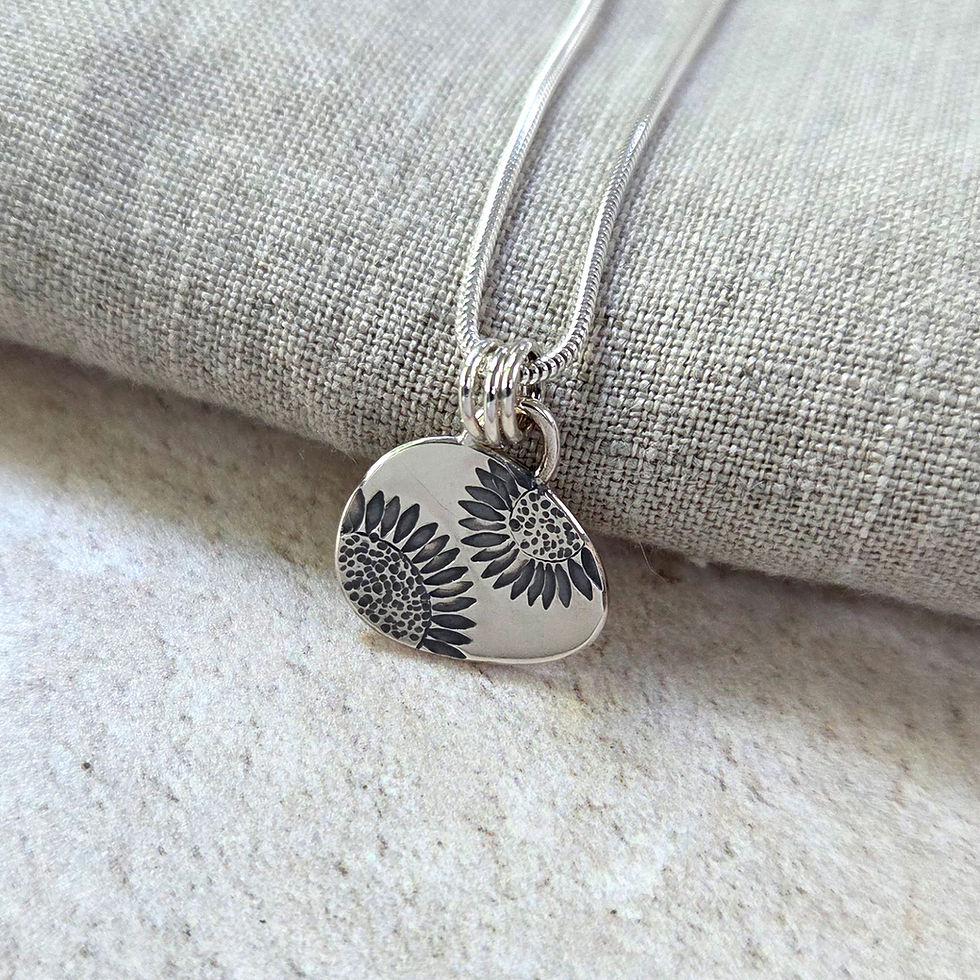 Two sunflowers solid silver pendant