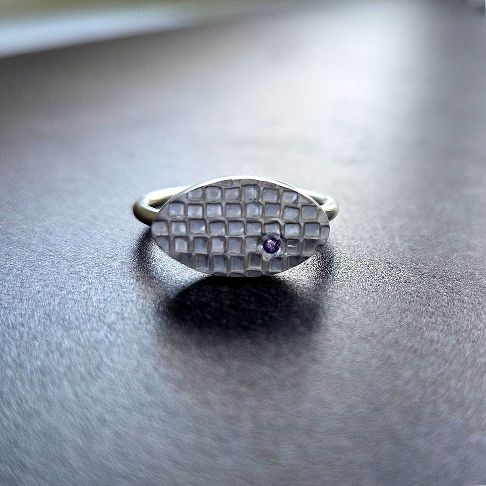 Oval handcrafted silver ring with tiny amethyst size O
