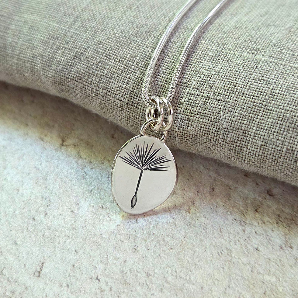 Silver dandelion seed pendant