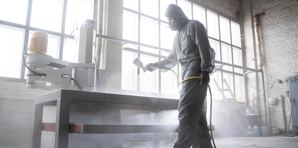 man-spraying-powder-paint-full-shot.jpg