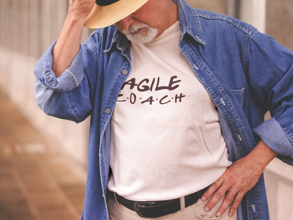 stylish-white-senior-man-wearing-a-round-neck-tee-mockup-with-a-hat-a12389.png