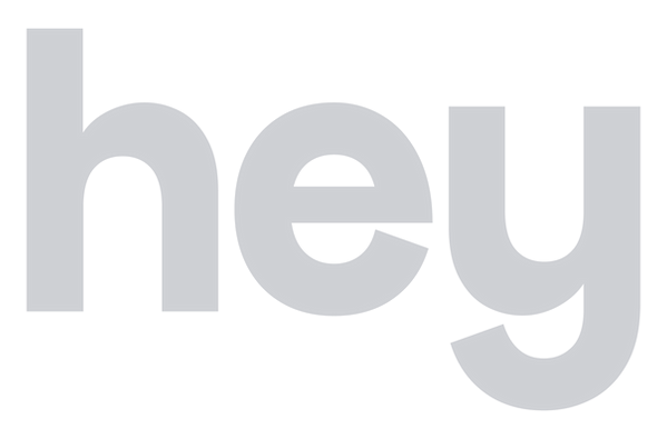 Large overlay graphic of word 'hey'
