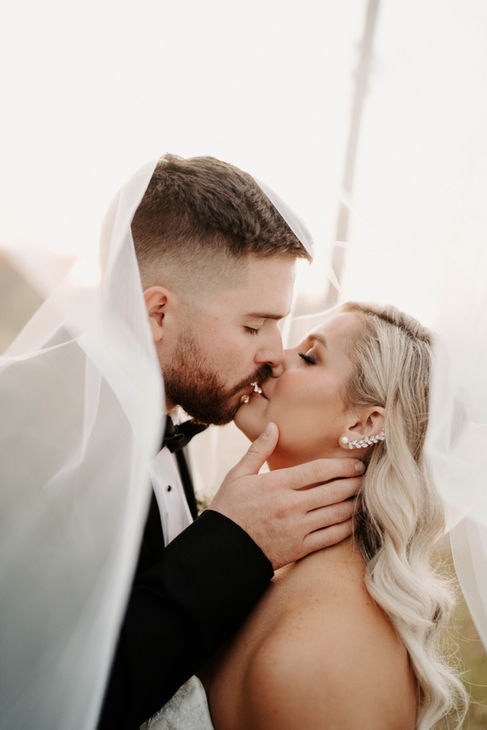 bride kissing groom