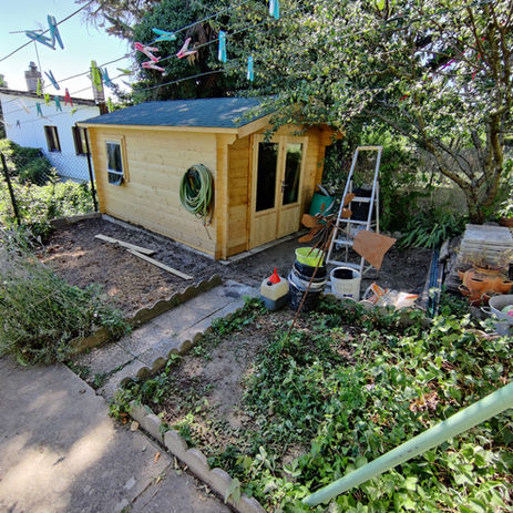 Chalet bois jaune terminé toiture shingle verte construction ossature bois Argenteuil 95