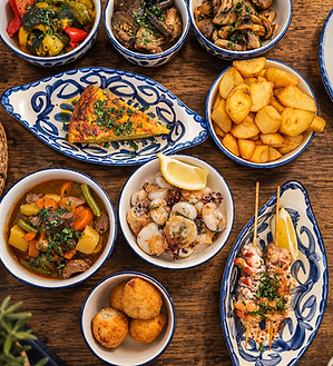 Tapas der La Tasca auf einen Holztisch.PNG