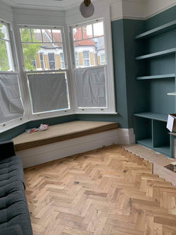 Archidea – Home renovation specialists – showcases a Sheffield home with vibrant green walls.