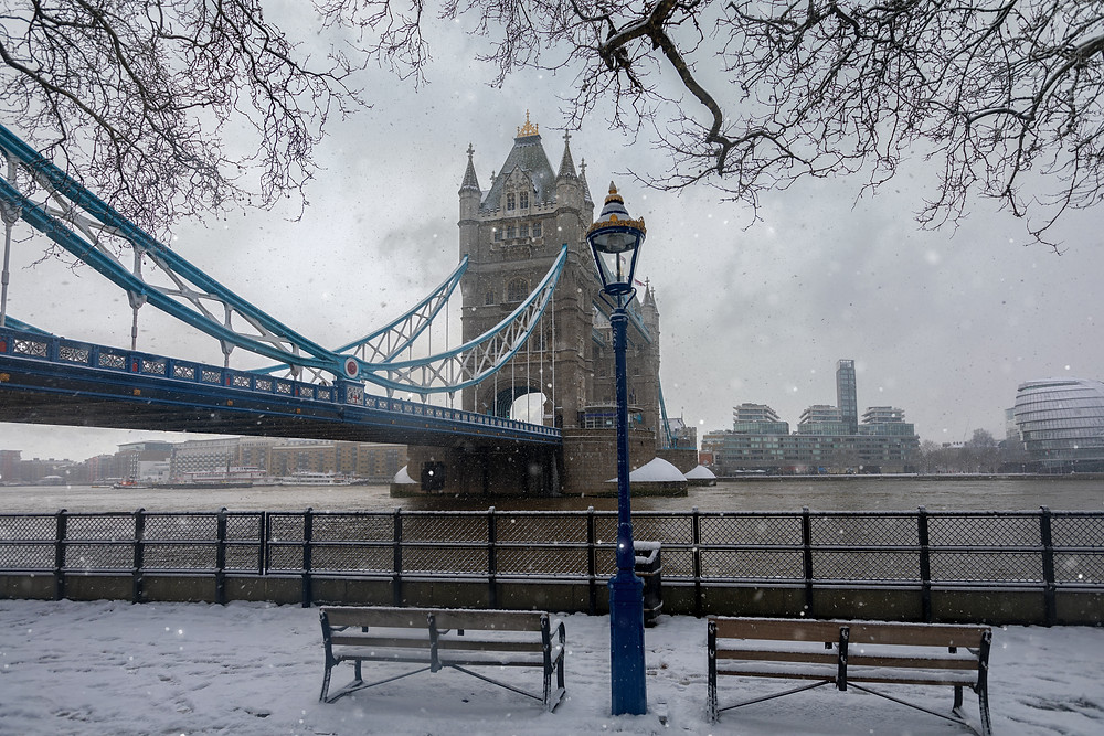 A photo of Tower Bridge in London in snowy weather.