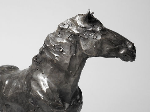 Windblown, bronze sculpture of a clydesdale by Kindrie Grove