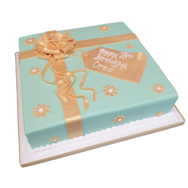 A delicious and beautifully crafted 14" parcel-shaped cake perfect for any special occasion or celebration.