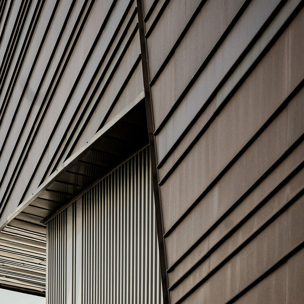 Angular building facade representing Erich Group's commercial project capability