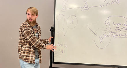A 3D student illustrating Biblical truth during student teaching.