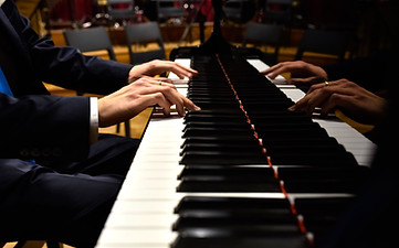 professional-pianist-performing-a-piece-on-a-grand-2026-03-10-04-48-53-utc.jpg