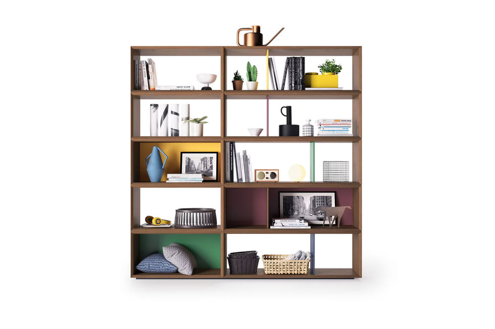 Modern modular shelving unit with books, plants, and decorative objects