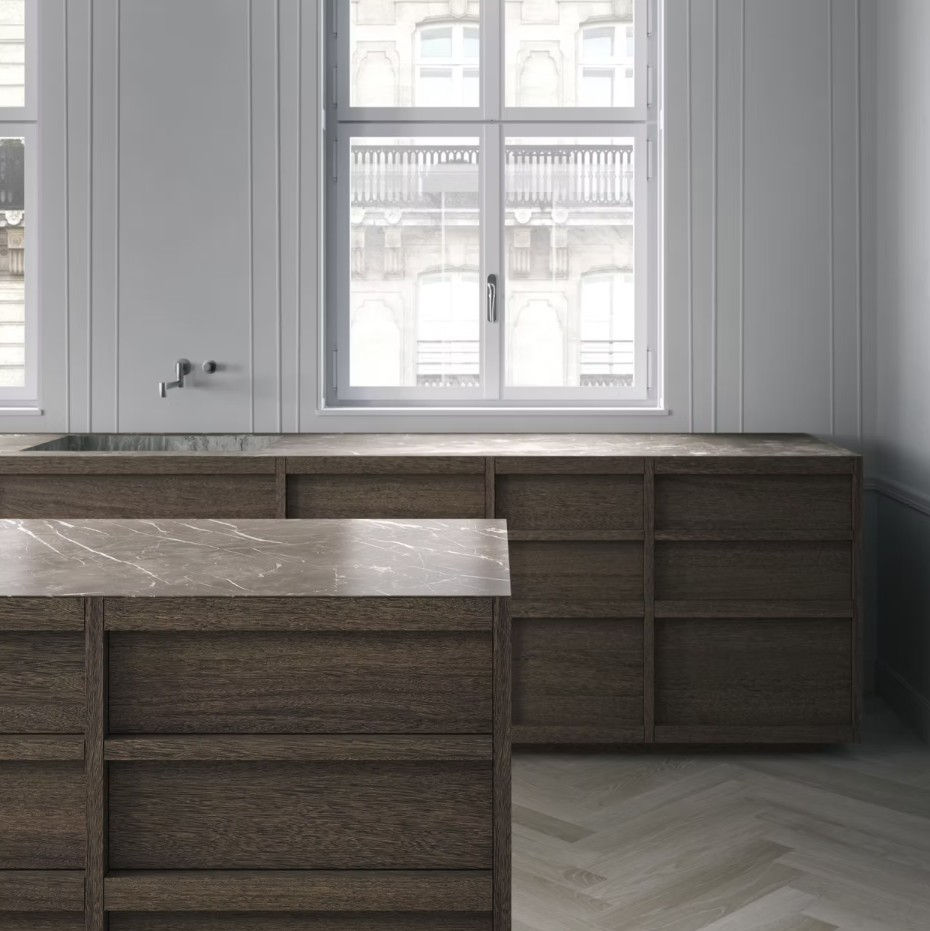 Modern kitchen with wooden cabinets and marble countertops