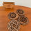 Thumbnail: Walnut coasters with floral pattern