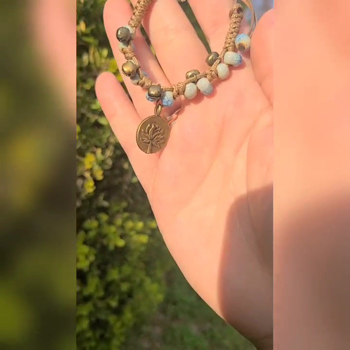 Thumbnail: Power Bracelet with Lotus Charm- Bells- Ceramic Beads Reiki Infused