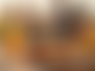 A wide horizontal composition captures a glistening perfectly grilled hot dog resting in a toasted b