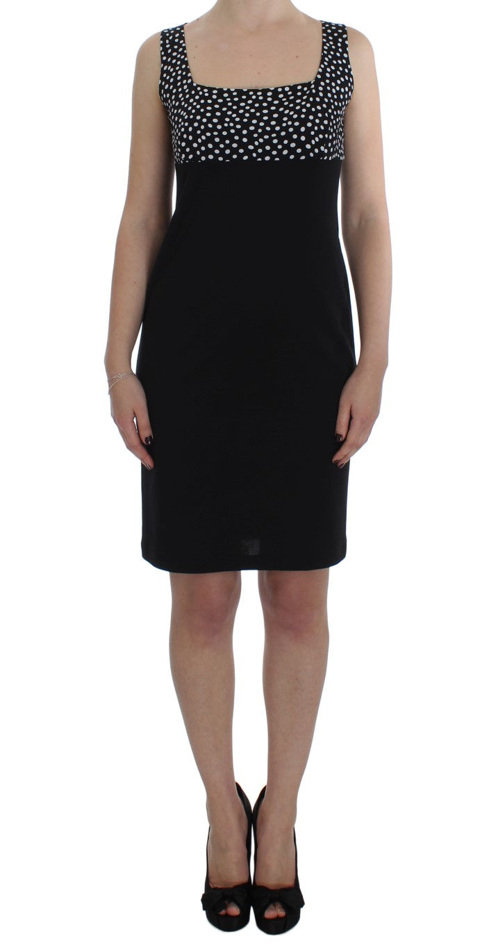 Thumbnail: Chic Polka Dot Dress & Sweater Set