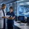 Healthcare professionals using paper workflows in a hospital, symbolizing cybersecurity and network isolation.