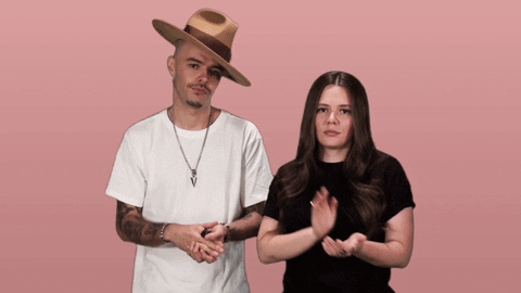 White male and female clapping non enthusiastic