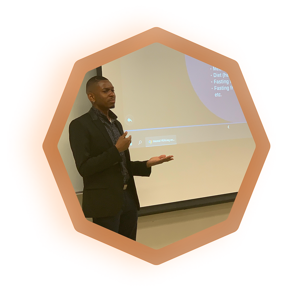 A photo of Gray the Griot presenting at the Black Vision Conference