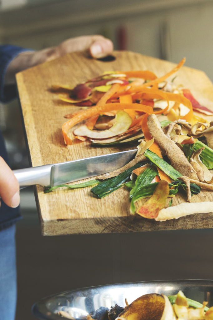 Putting food scrapes on bowl