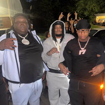 BullyGang OO poses with Chicago rapper VonOff1700 and supporters during a visit to Bridgeport, Connecticut.