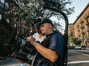 Frankie Fire holding camera on set — 2TYME Awards 2025 Director of the Year