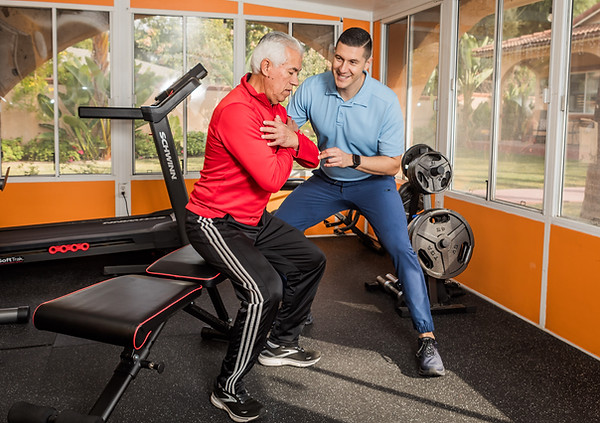 Client exercising with occupational therapist