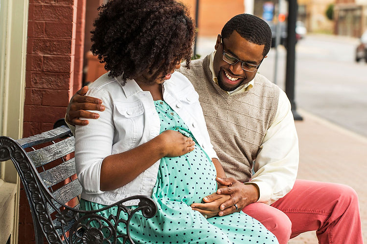 Pregnant Couple Bench.jpg