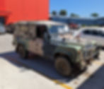 Close-up view of Land Rover Defender Perentie parked in a driveway