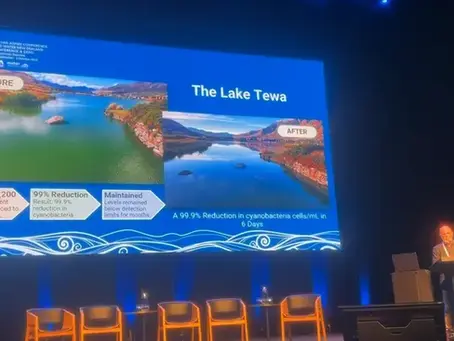 Hydro Synergy Ltd. CEO Ric Church presenting Lake Tewa field results at the 2025 Water NZ Conference, showing before-and-after cyanobacteria conditions during NZ ultrasonic algal management trials.