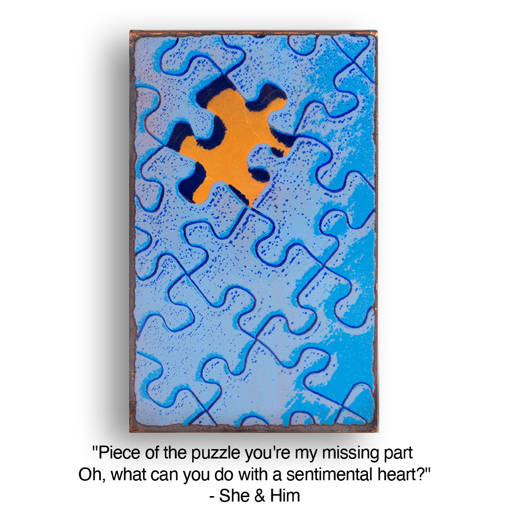 Missing puzzle piece in a blue puzzle on a black background.
