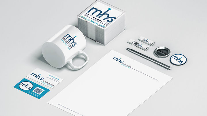 Image of an assortment of branded promotional products and print collateral
