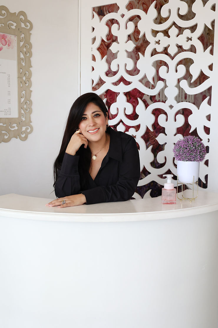 owner in her nail botique